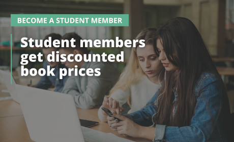 student members get discounted book prices in foreground with students sat at a desk in background